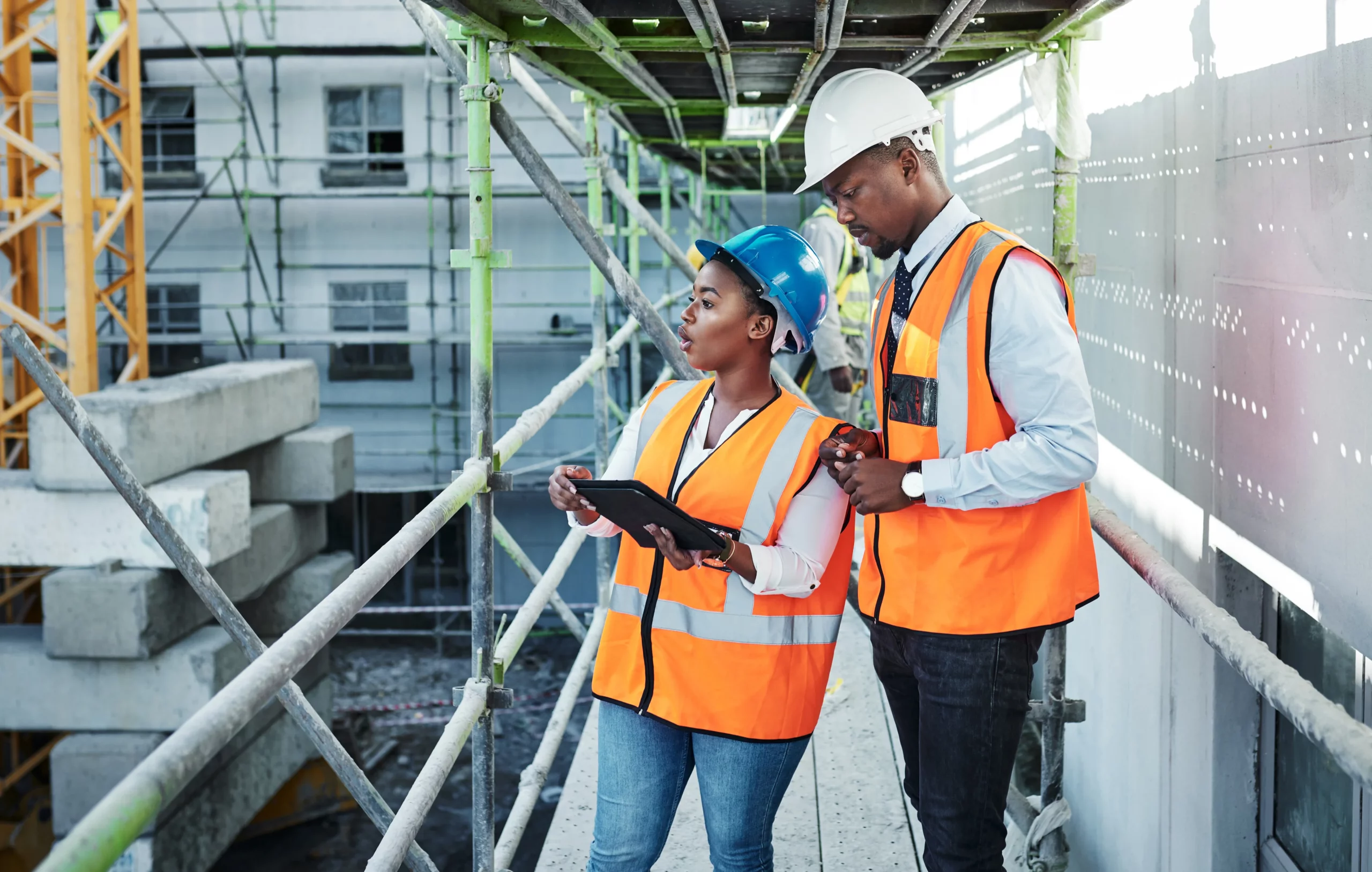 A man and woman discussing health and safety