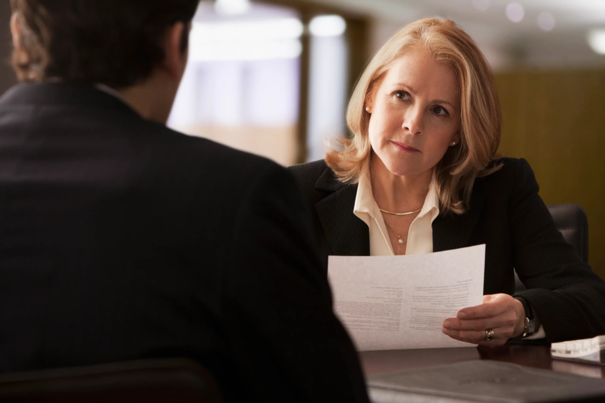 Woman interviewing a man