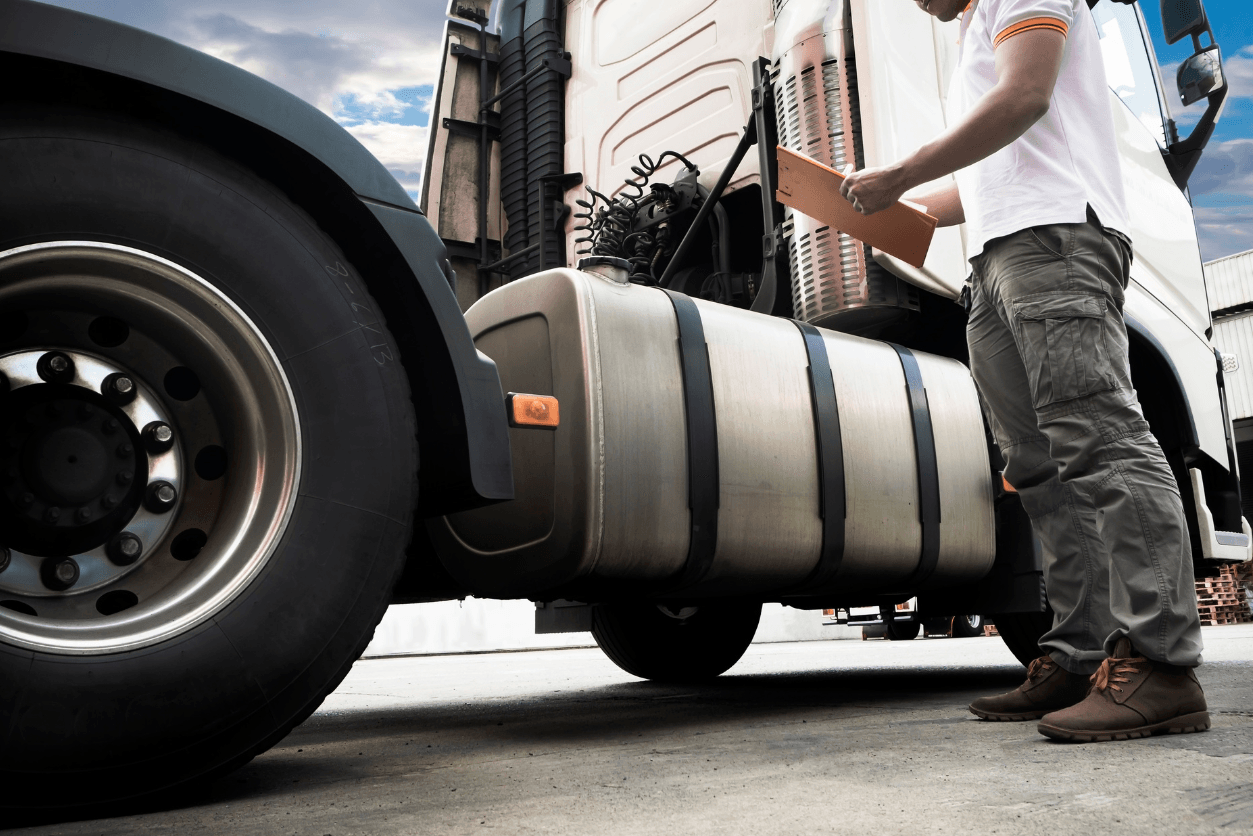 Man stood next to a HGV